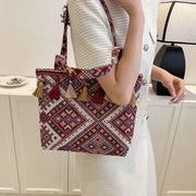 Bohemian Handwoven Tote Bag with Geometric Patterns and Tassel Embellishments