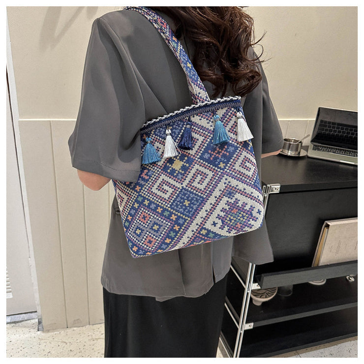 Bohemian Handwoven Tote Bag with Geometric Patterns and Tassel Embellishments