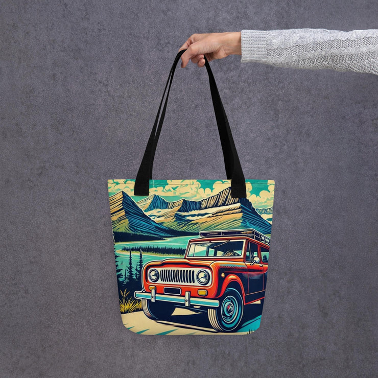 Vintage Off-Road Adventure Tote Bag  Classic International Scout SUV in Majestic Mountain Landscape